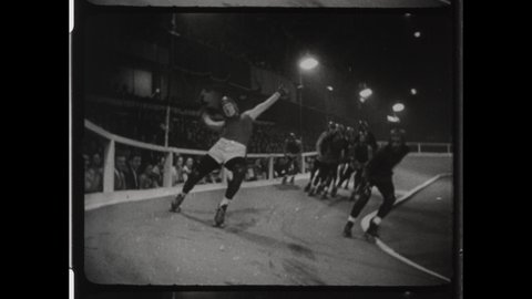1940s Manhattan, New York City, NY. Men compete in Roller Derby  Competition at the 69th Regiment Armory. Skaters Collide and Fall Over 4K Overscan of Vintage Archival 16mm Film Print