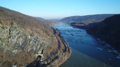 An aerial drone view of Harpers Ferry and the BO Railroad Potomac River Crossing in Jefferson County, West Virginia on a cold January afternoon.