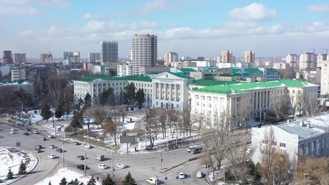 March 8, 2021, Russia, Rostov-on-Don. DSTU University building in winter against the background of the city and buildings