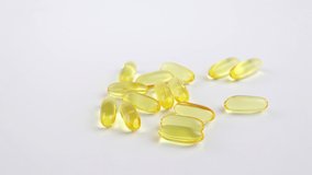 Omega 3 capsules on a white background. Food supplements, vitamins.