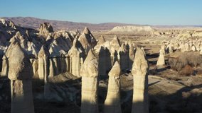 Cappadocia's major tourist attraction love-valley air view video. Cappadocia (Kapadokya) is known as one of the best places to fly with hot air balloons worldwide. Goreme, Cappadocia, Turkey.