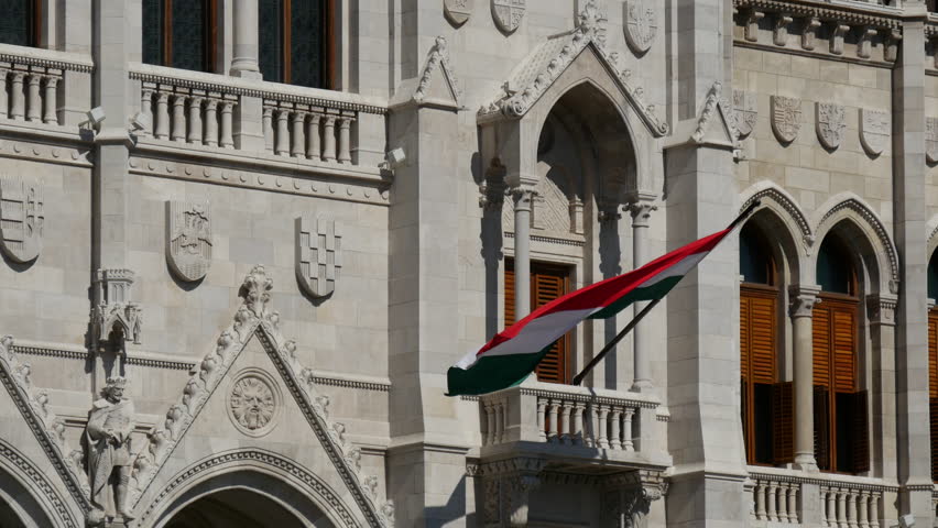 The Hungarian flag at the Hungarian Parliament Building in Budapest, Hungary