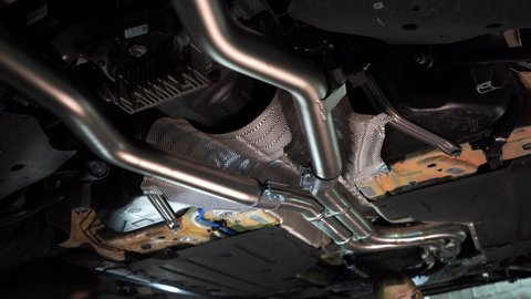 Installing an exhaust system in a car