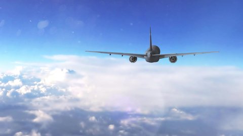 Cargo aircraft jet flying in the sky, plane flying away, airplane flying over clouds, shot from behind, commercial aircraft, commercial airliner