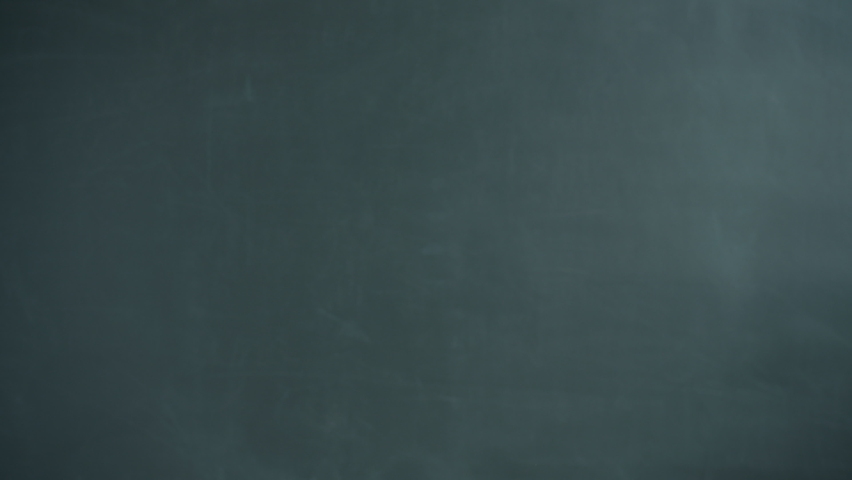 Slow motion portrait of playful young lady moving dancing and looking at camera on gray background. Happy people and positive emotions concept.