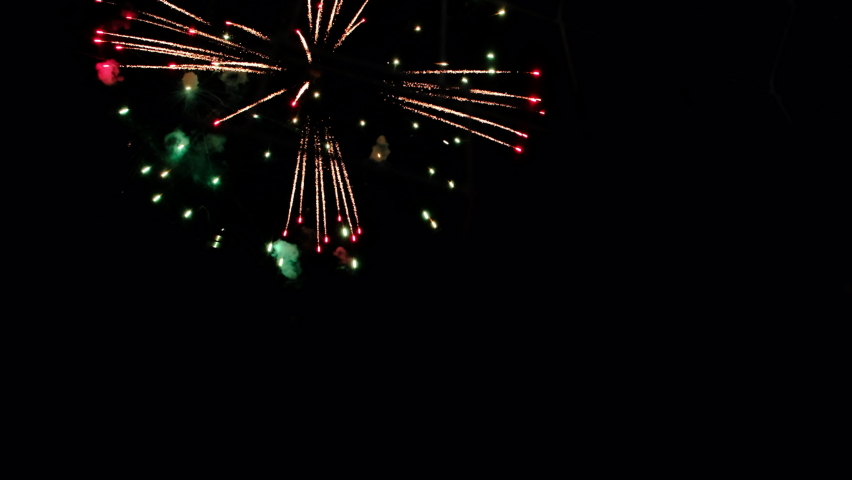 Beautiful colorful fireworks in dark sky | Shutterstock HD Video #1068769250