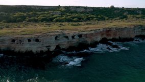 Video of picturesque rocky coastline of Yailata archeological reserve in Bulgaria with 