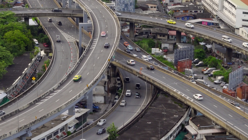 Traffic on highway road junctions in Bangkok, Thailand since Public transport, lifestyle, traveler, concept of urban life in Asia, bird's eye view
 Royalty-Free Stock Footage #1068778226