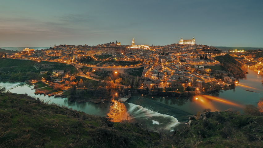 Time-lapse above aerial drone point of view Toledo historical picturesque city of Spain surrounded by Tagus river located on hilltop, day evening scene view. Castilla–La Mancha. Timelapse, hyperlapse 