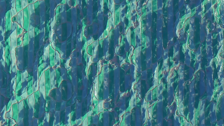 4K Top view of crystal clear water, looped background, natural texture ...