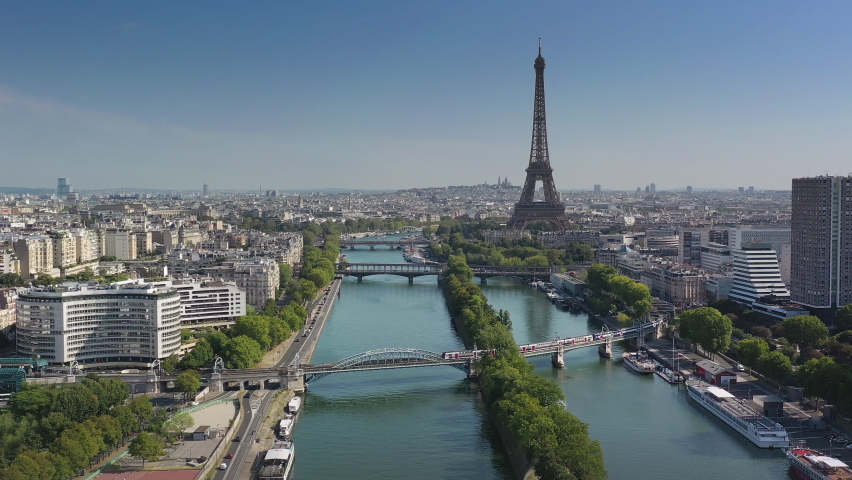 Sunny day paris city famous central river traffic bridges tower district aerial panorama 4k france | Shutterstock HD Video #1068803141