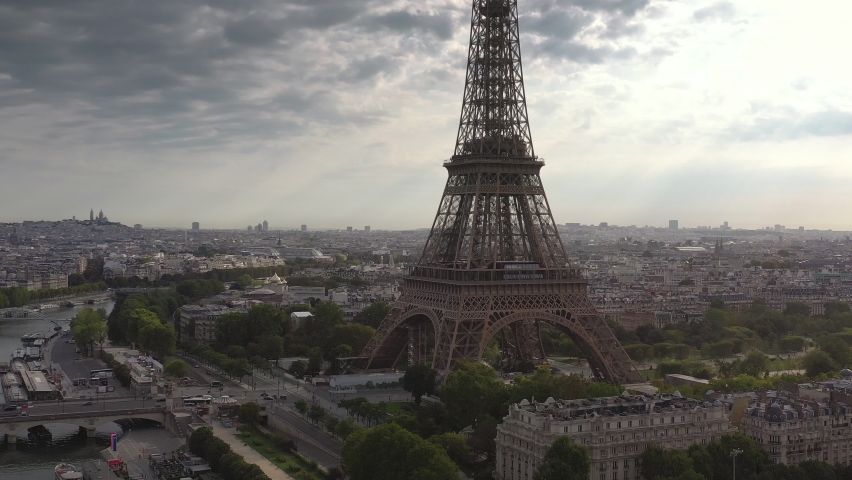 Cloudy day paris city center famous tower square riverside aerial panorama 4k france