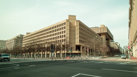 A time-lapse of the J. Edgar Hoover Building, headquarters of the Federal Bureau of Investigation (FBI), in Washington, DC, seen from the intersection of Pennsylvania Avenue NW and 9th Street NW.