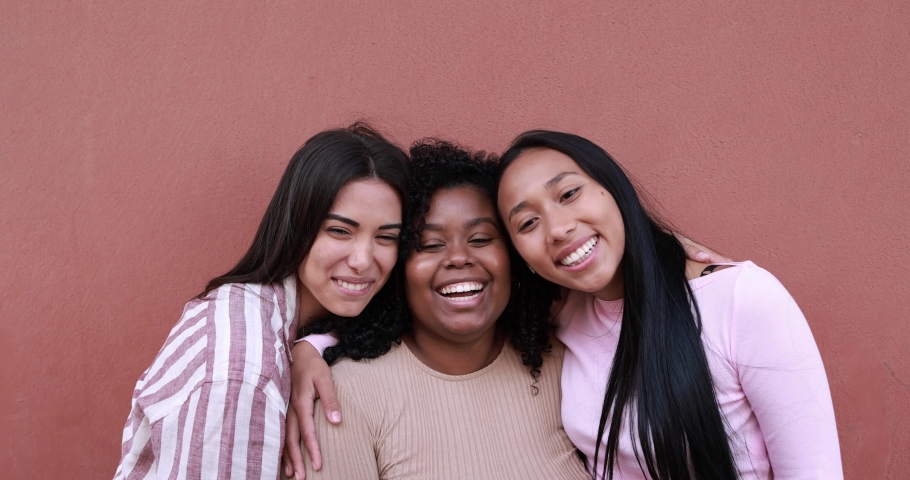 Beautiful young latin girls with different skins colors and bodies having fun together - Concept of friendship and happiness | Shutterstock HD Video #1068804995