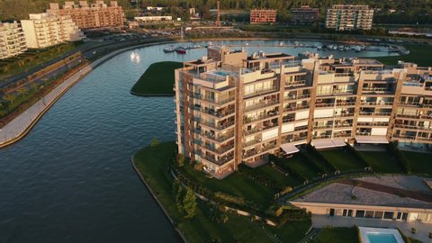 Beautiful Circular Aerial Shot of Luxury Apartment Buildings and Marina, In Nordelta, Buenos Aires, Argentina.