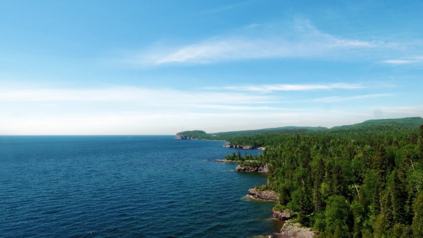 Oceanic cliff side view of lake superior at Tettegouci state park Minnesota on top of the cliff lookout.