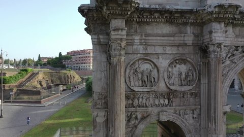 The Colosseum and the Arch of Constantine in Imperial Rome
Close up aerial view with vertical movement