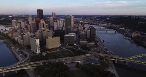 PITTSBURGH, PENNSYLVANIA - SEPTEMBER 29, 2019: Aerial view of Pittsburgh, Pennsylvania. Business district and rivers in Background. Sunset Ligh