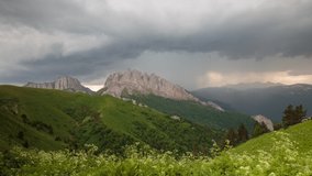 Russia, time lapse. The formation and movement of clouds over the summer slopes of Adygea Bolshoy Thach and the Caucasus Mountains 