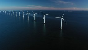 Oceanic wind turbines at the coastal windmill farm, Middelgrunden, just outside Copenhagen, Denmark.  - Powered by Shutterstock - Get 15% off with code: PIKWIZARD15