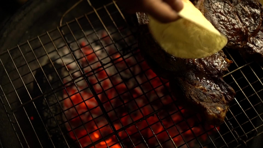 Tortillas and steaks are getting ready on the grill for a delicious barbecue party! | Shutterstock HD Video #1068851291