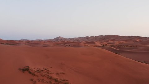 Sunrise over the sand dunes in the desert, Aerial view. Sand dunes in the Gobi Desert. 4k, 10 bit