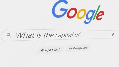 NEW YORK CITY, NY - CIRCA 2021: Google Search Engine, Search For "What is the Capital" In Google's Search Bar - Editorial Animation Rendering