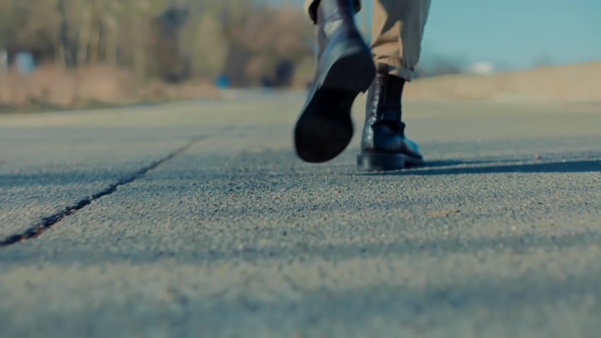 confidence man feet walking on road Stock Footage Video (100% Royalty ...