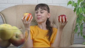 Eat fruit on internet video. A view of a child eating apples and record video for internet vlog.