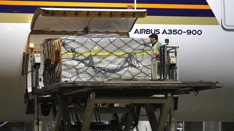 Mumbai, India - 26 February 2021: Cargo containers being loaded inside the aircraft