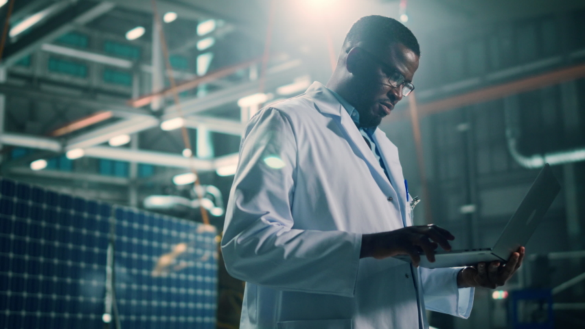 Industrial Engineer Working on Artificial Satellite Construction. Aerospace Agency: African American Scientist Using Tablet Computer to Develop Spacecraft for Space Exploration and Data Communication. Royalty-Free Stock Footage #1068878147