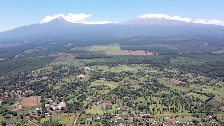 A small village in Kenya Africa with the background of the mount Kilimajaro. kilimanjaro Africa. Biggest mountain in Africa kenya. kenya view of the mount kilimanjaro. loitokitok Amboseli kilimajaro.
