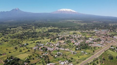 A small village in Kenya Africa with the background of the mount Kilimajaro. kilimanjaro Africa. Biggest mountain in Africa kenya. kenya view of the mount kilimanjaro. loitokitok Amboseli kilimajaro.