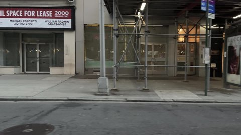 NYC, USA - MARCH 10, 2021: retail space for lease closed out of business stores and shops 5th Avenue Manhattan New York City.