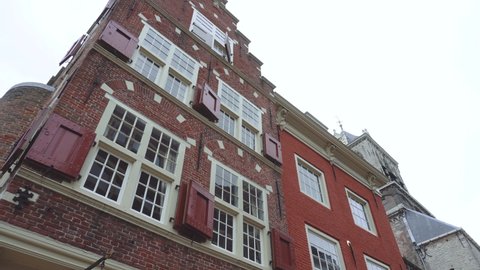 Details of Fascades on Central square of Delft City in Netherlands surrounded by old Dutch houses