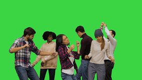 Young men and women dancing at the party on a Green Screen, Chroma Key. - Powered by Shutterstock - Get 15% off with code: PIKWIZARD15