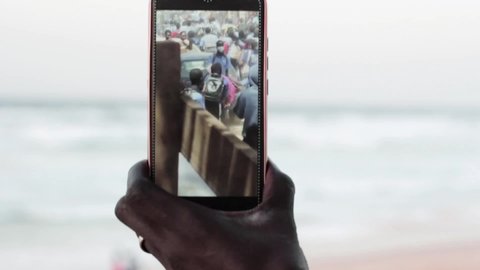 Dakar, Senegal - March 9, 2021: Sonko Senegal Protests, Senegalese hands, Mobile footage.