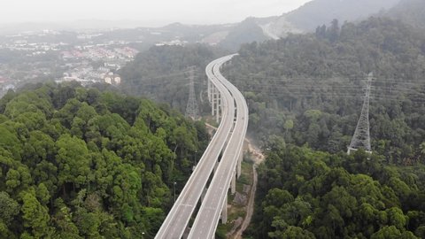 Aerial view of beautiful forest and the amazing highway at Rawang Bypass Selangor
