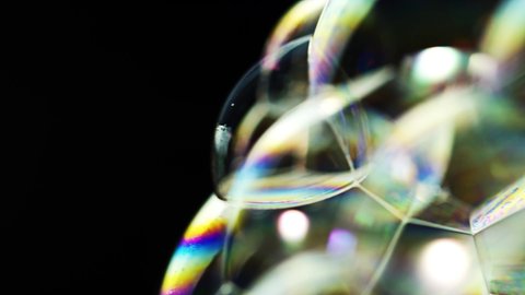 Soap Bubbles Macro shoot. Clean soft elegant bright footage background. Close-up foam colors twirl. Washing disinfection. Shoot on Red Dragon camera (slow motion high quality).