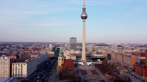 The famous TV Tower of Berlin at Alexanderplatz Square - BERLIN, GERMANY - MARCH 10, 2021