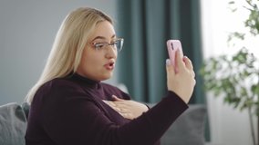 Plus size woman with smartphone