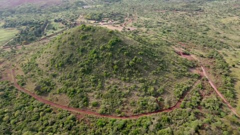 A view of drone flying over the hill in the middle of African farms. Africa farms bird view of drone on a mountain, drone vie won the hill in Africa kenya