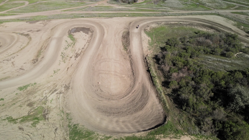 Dirt bike cornering on Prairie City Off-Highway motor vehicle recreation at the foothills of the Sierra Nevada foothills