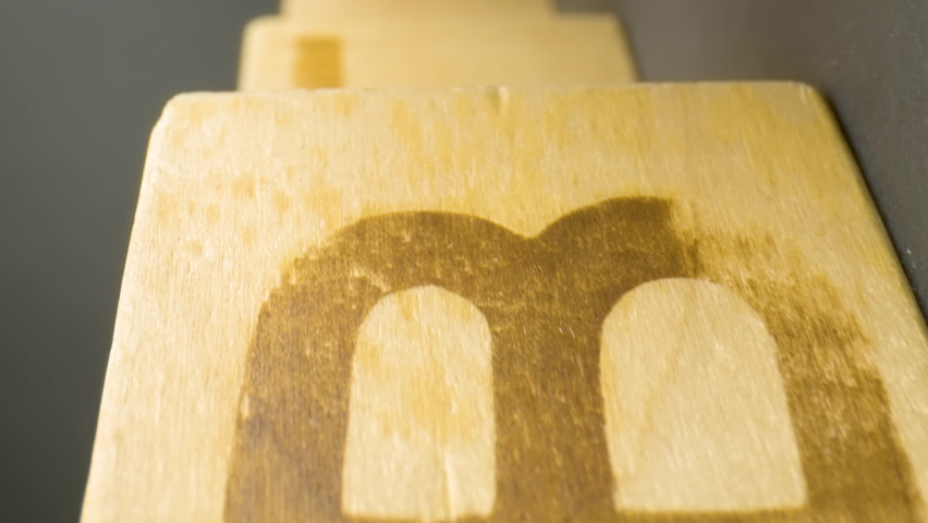 Lots of wooden blocks with the letters on each on top of the table in Estonia vertical video
