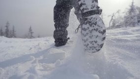 winter walk in the snow, outdoor walking workouts, winte walking. close up view of shoes walking on snow. beautiful nature background. winter footwear, shoes or boots - Powered by Shutterstock - Get 15% off with code: PIKWIZARD15
