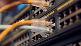 IT Engineer Patching Network Equipment In Server Room. Network Engineer Maintenance Work In Server Room . IT Technician Works With Ware And Cables in Big Data Center. Connecting Lan Cable To Mainframe - Powered by Shutterstock - Get 15% off with code: PIKWIZARD15