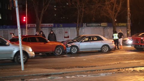 Kyiv, Ukraine - 03.13.2021: BMW car collided with Subaru Impreza at night