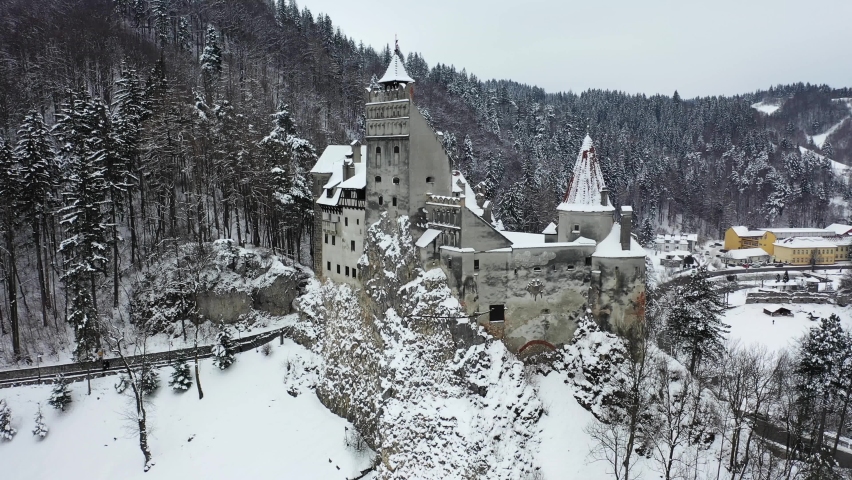 Brasov, Transylvania. Romania. Winter view of the medieval Castle of Bran, known for the myth of Dracula. Royalty-Free Stock Footage #1069105165