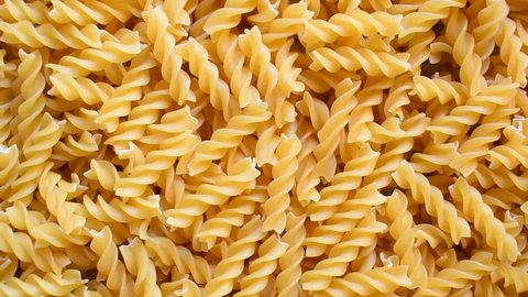 Raw whole dry Fusilli pasta