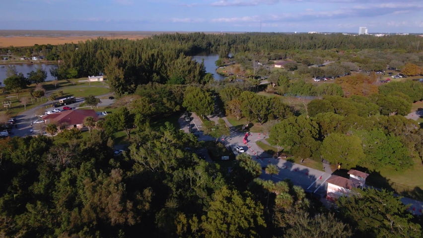 Aerial drone view over cars and roads in Markham park, Weston, Florida, USA